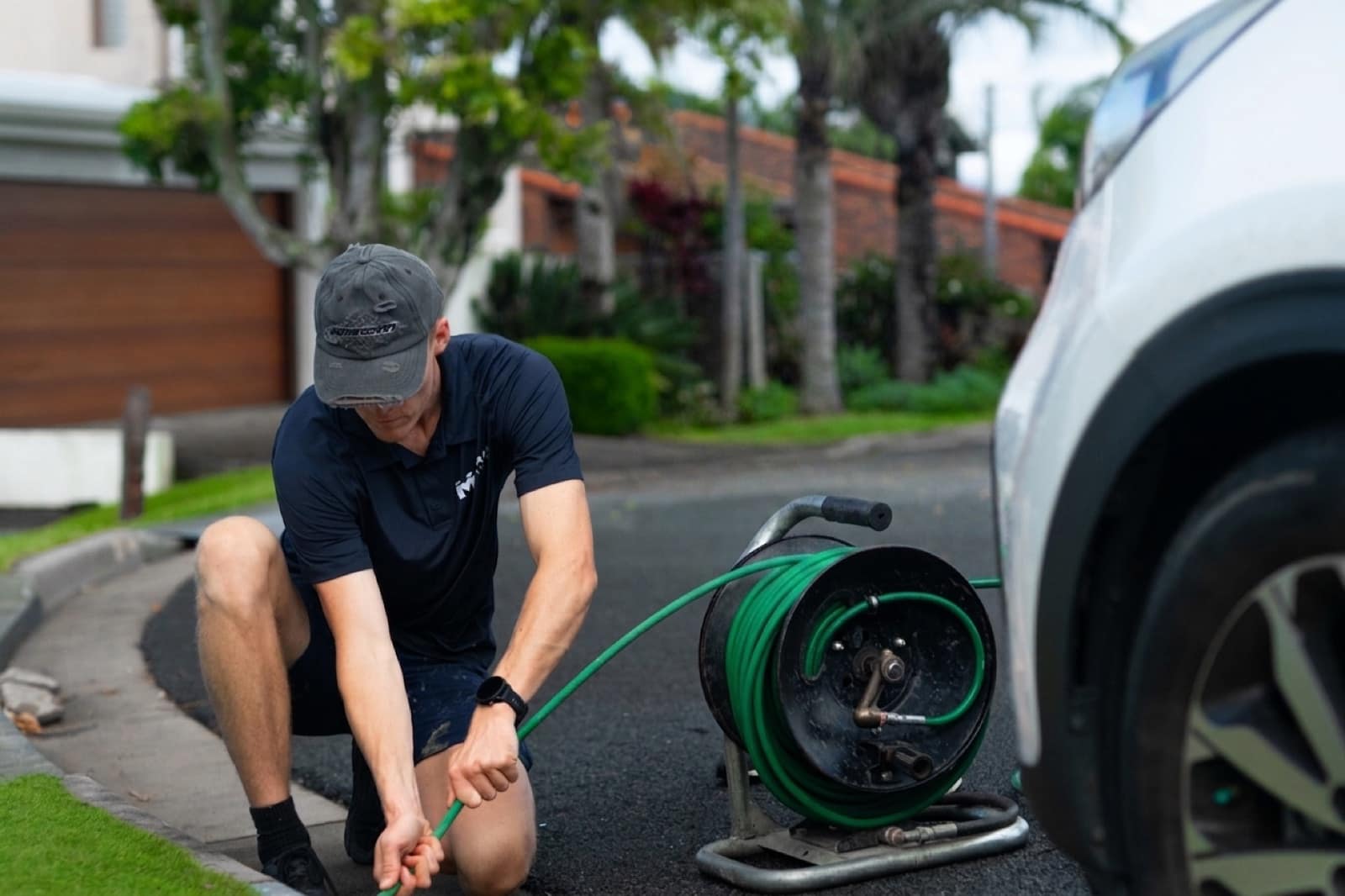 The CCTV drain inspection reel set up at the kerb on a Gold Coast job